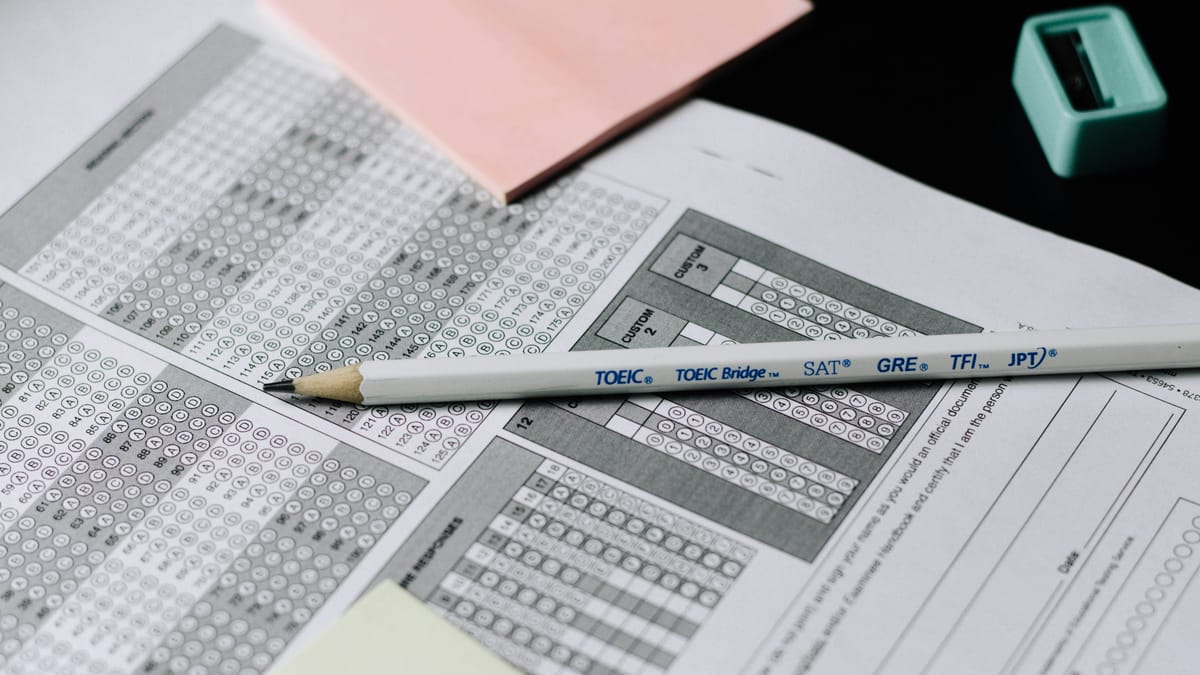 A pencil lying on a multiple-choice answer sheet